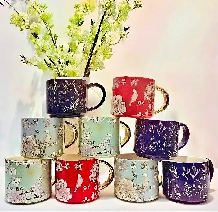 Keraamiline kruus elektroplekkitud kuldkäepidemega